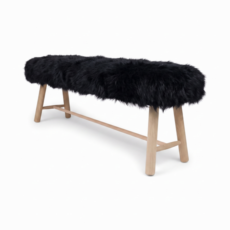 Theodor Bijzet Bank | Nieuw-Zeelandse Schapenvacht | Langharige | Eikenhouten poten | 140x35x45 cm Zwart